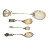 Four Arts & Crafts white metal spoons,