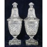 Pair of lidded cut glass vases