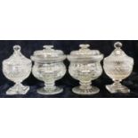 Two pairs of lidded honey pots