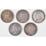 Four silver Victoria Crowns and a silver 1924 Liberty Dollar (5).