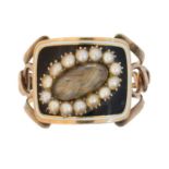 A Georgian enamel and split pearl mourning ring,