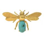A bug brooch,