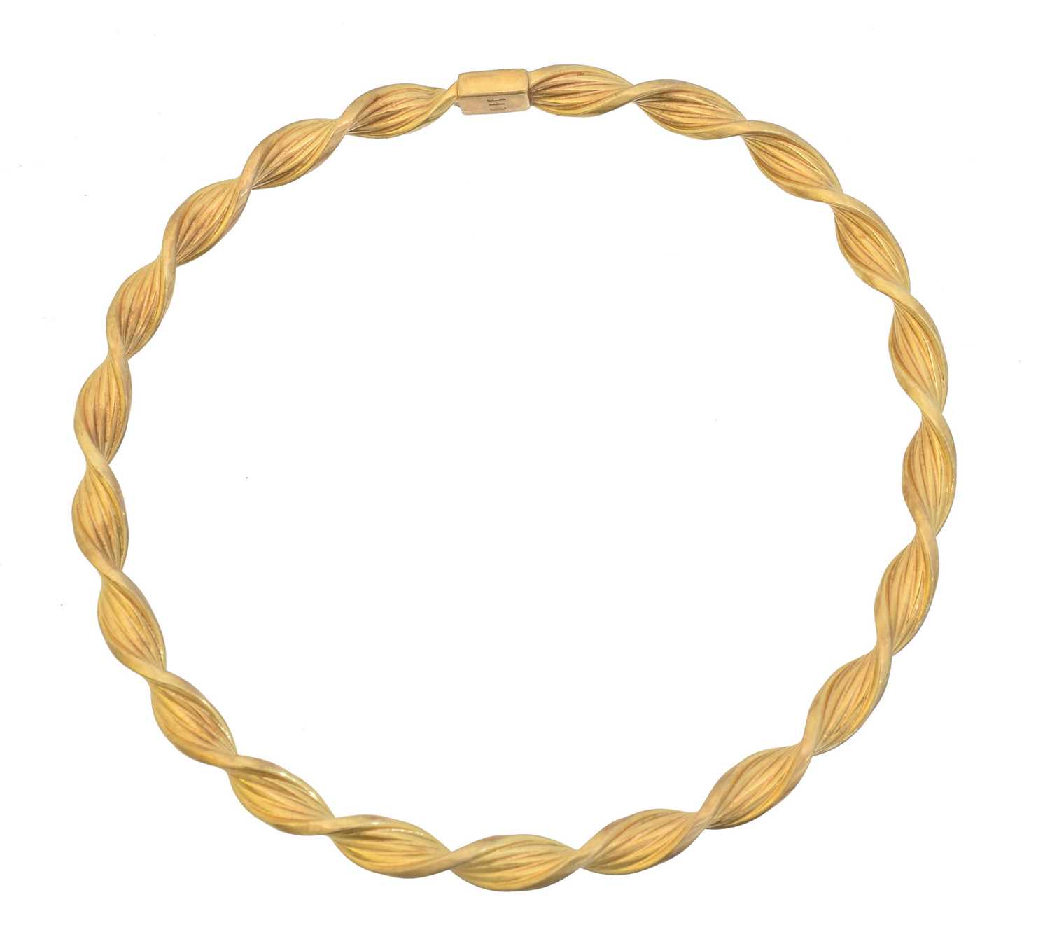 A 9ct gold bangle by UnoAErre,