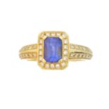 An 18ct gold tanzanite and diamond cluster ring,