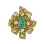 A 1970s French emerald and diamond cluster ring,