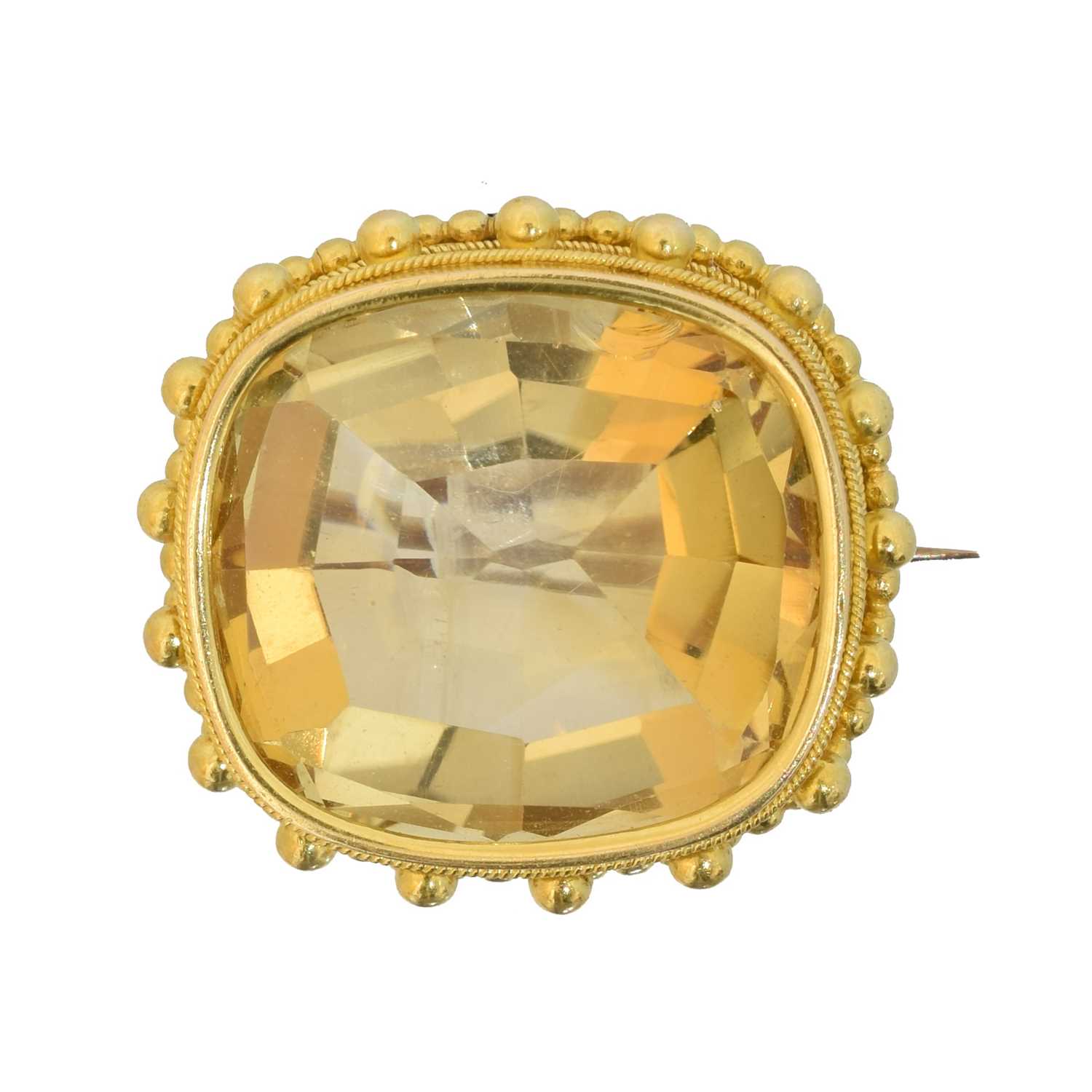 A citrine brooch,