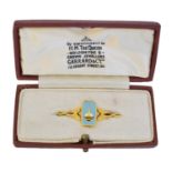 A 9ct gold Garrard enamel brooch,
