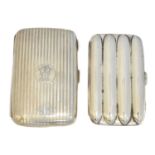 Two early 20th century silver cigar cases,