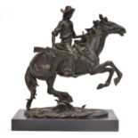 Bronze of A Cowboy After Frederick Remington