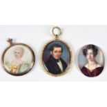 English School (19th century) Two female and one male portrait miniatures
