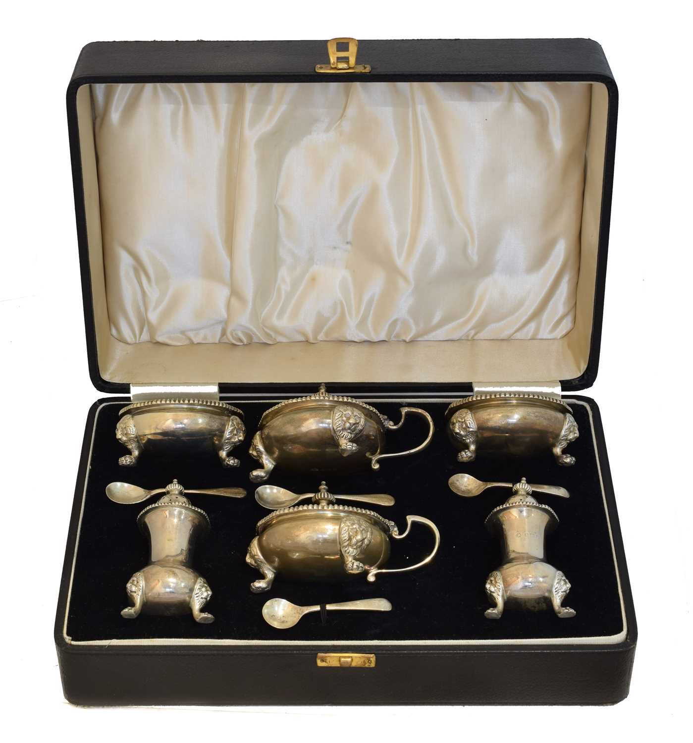 A George VI cased silver cruet set,