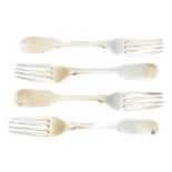 A selection of silver dessert forks,