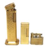 Three Gilt metal Dunhill lighters