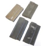 Four M14 rifle magazines, three original and one aftermarket