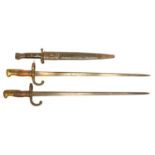 1888 pattern bayonet and scabbard and two Grass 1876 bayonets