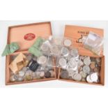 Two boxes of assorted British and foreign coinage to include some silver and copper coinage.