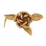 An 18ct gold diamond brooch,