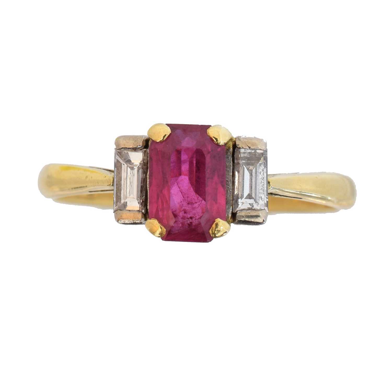 An 18ct gold ruby and diamond three stone ring,