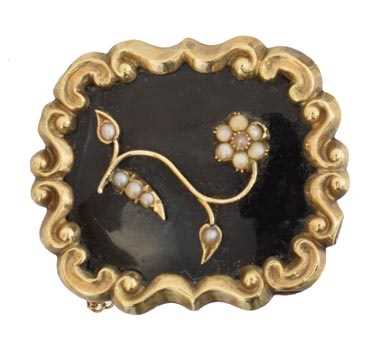 A Victorian enamel and split pearl mourning brooch,