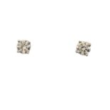 A pair of diamond stud earrings,