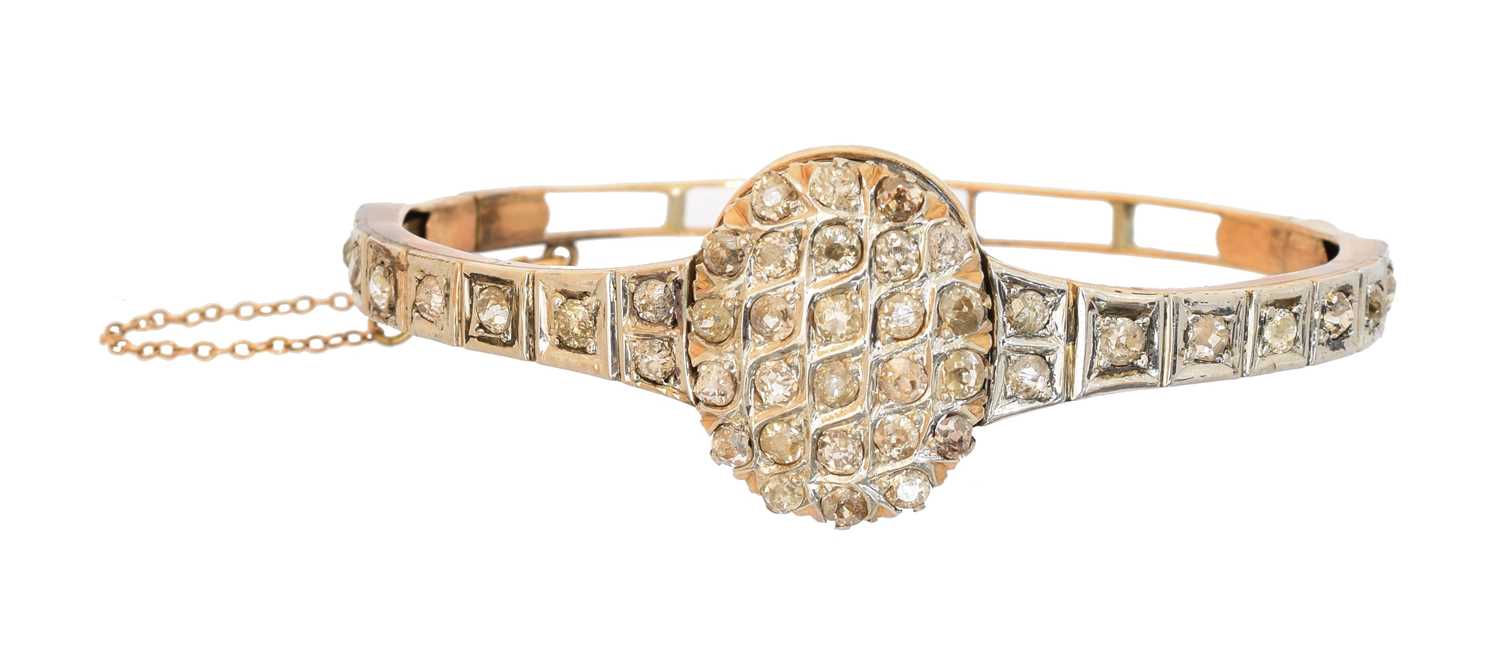 A diamond hinged bangle,