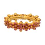 An Indian ruby hinged bangle,