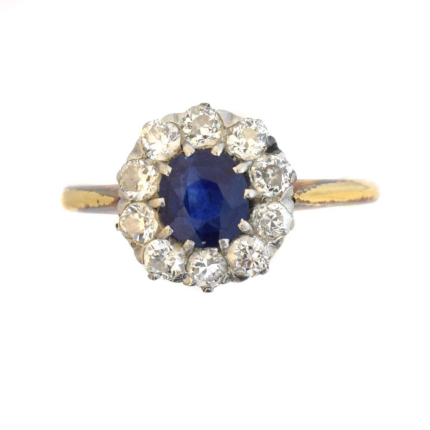 An 18ct gold sapphire and diamond cluster ring,