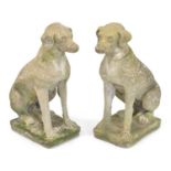 Pair of Composition Stone Seated Dogs