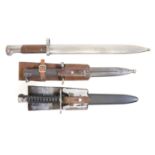 Three bayonets and scabbards