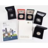 Assortment of silver proof coins, annual coin sets and modern commemorative coins.