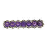 An early 20th century amethyst and diamond brooch,