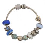 A silver Pandora charm bracelet,