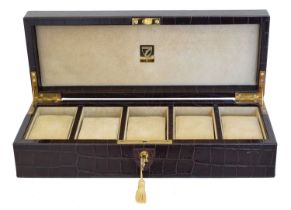 A watch display case by Aspinal,