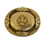 A Victorian Etruscan brooch,