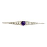 An amethyst and diamond brooch,