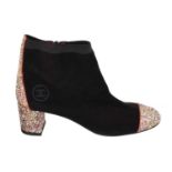 A pair of Chanel suede heeled ankle boots,