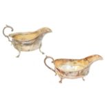 Two silver sauce boats,
