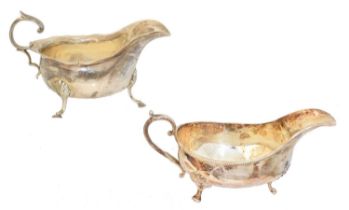 Two silver sauce boats,