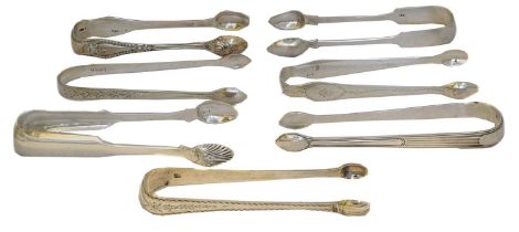 A selection of late 18th century and later silver sugar tongs,