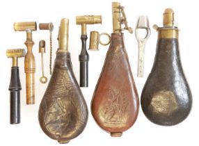 Collection of powder flasks and measures,