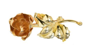 An 18ct gold floral brooch,