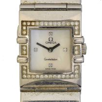 A stainless steel Omega Constellation quartz wristwatch,
