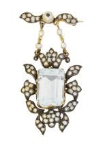 An aquamarine and split pearl pendant/brooch,