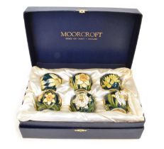 Boxed set of six Moorcroft 'Daffodil' pattern eggcups