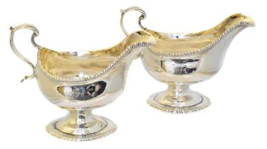 A pair of George III silver sauce boats,