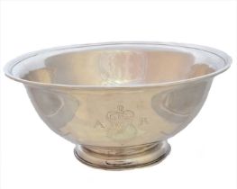 A Queen Anne Britannia silver shaving bowl
