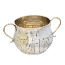 A James II silver porringer,