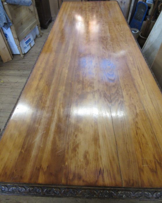 A 19th century Continental refectory dining table, the rectangular top raised on seven legs carved - Image 2 of 8