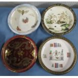 Four Carlton Ware shallow bowls, decorated in various patterns, to include Egyptian, dragons,