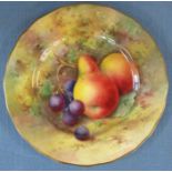 A Royal Worcester plate, painted with fruit to a mossy ground by E Townsend, diameter 6.25ins -